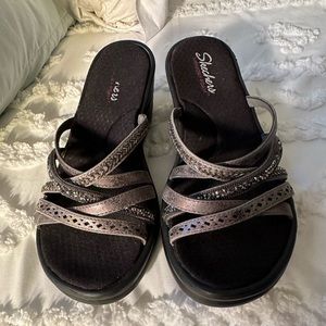 Super cute sketcher sandals.